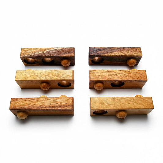 Woodtastic Easy Box 3D puzzle made of Monkey Pod wood, featuring 6 interlocking pieces with spherical wooden pegs.