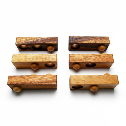 Woodtastic Easy Box 3D puzzle made of Monkey Pod wood, featuring 6 interlocking pieces with spherical wooden pegs.