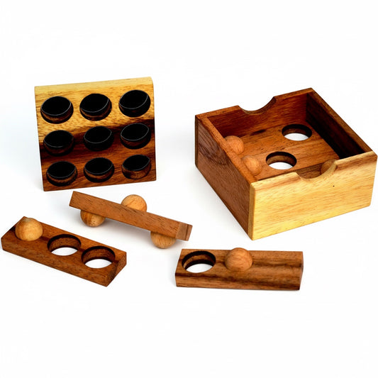 Woodtastic Easy Box 3D wooden puzzle with 6 pieces, made from Samanea wood. Features a box and several wooden pieces with holes and balls.