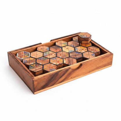 Woodtastic Hexadomino large hexagonal dominoes made of Samanea wood with colorful dots in a wooden box.