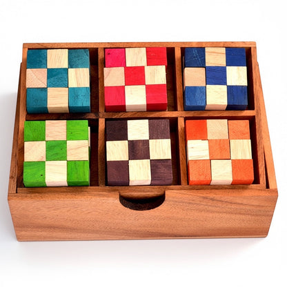 Woodtastic Snake Cube Level Box M, a set of 6 wooden puzzles in blue, red, dark blue, green, purple, and orange, each with a checkered pattern.