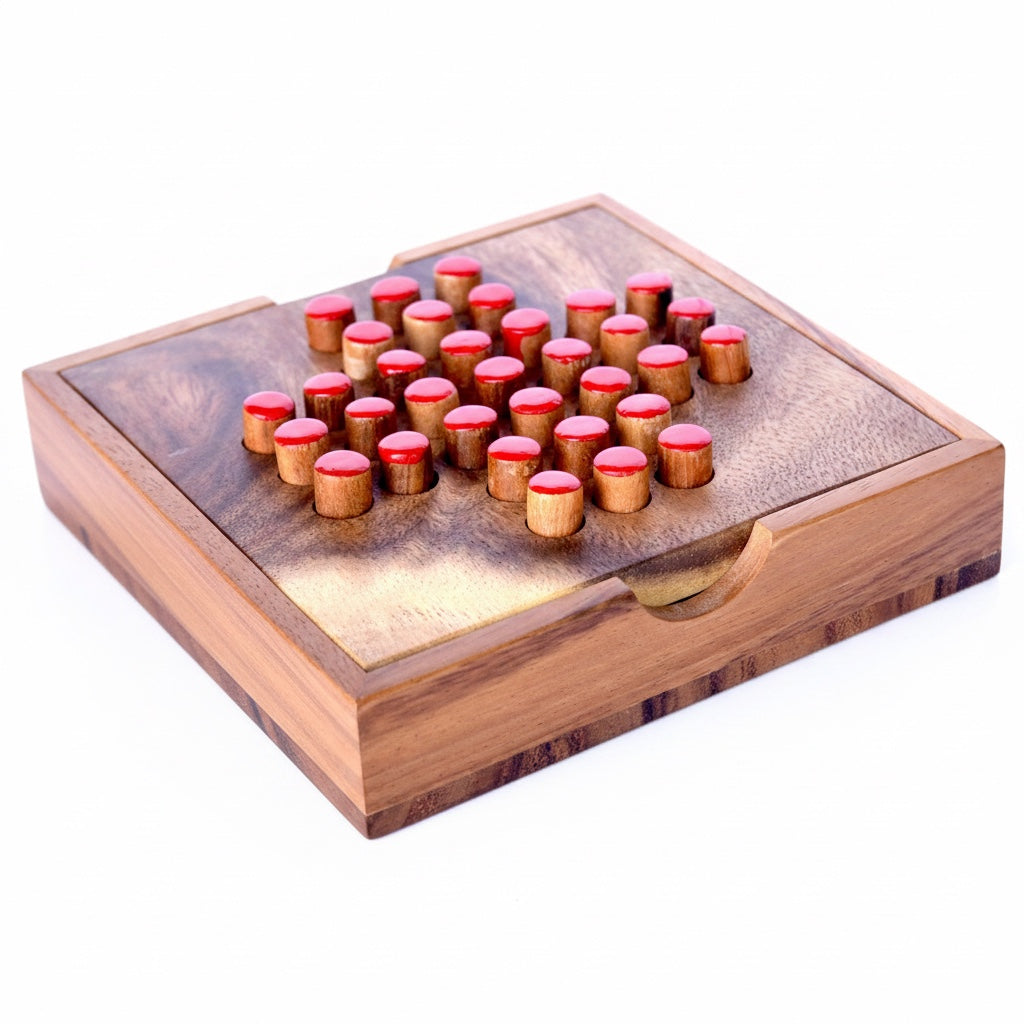 Woodtastic large solitaire peg game board made of Samanea wood with red-topped pegs.