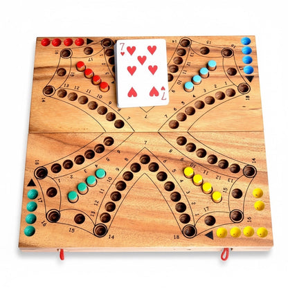 Woodtastic Tock Tock Dog 4-player board game made of Samanea wood with red, blue, green, and yellow playing pieces and a 7 of hearts card.